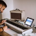 Behind the Hits: The Role of Ghostwriters in Artist Development