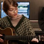 Ghost Notes: How Ghostwriters Shape Modern Music Trends